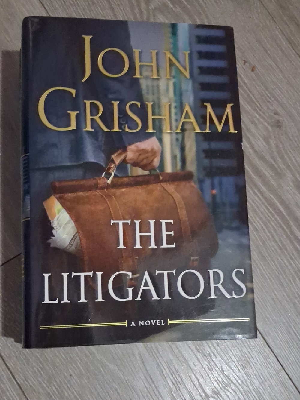 John Grisham "The Litigators" Hardcover Novel - Brown Cover